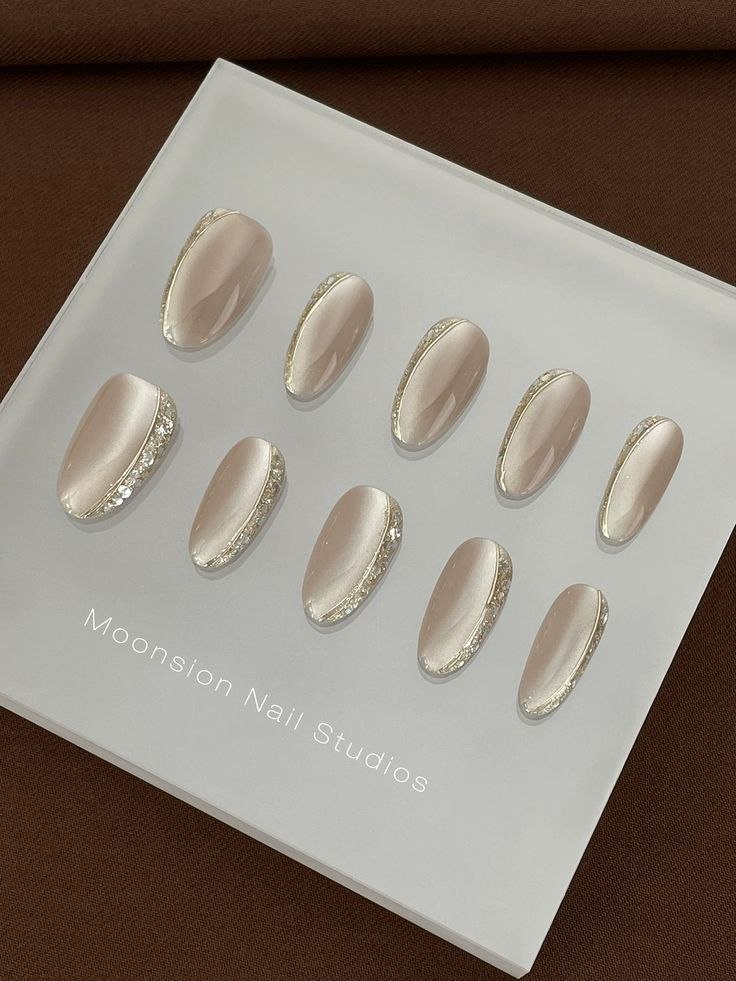 Moti Pearl Cat Eye press-on nail design